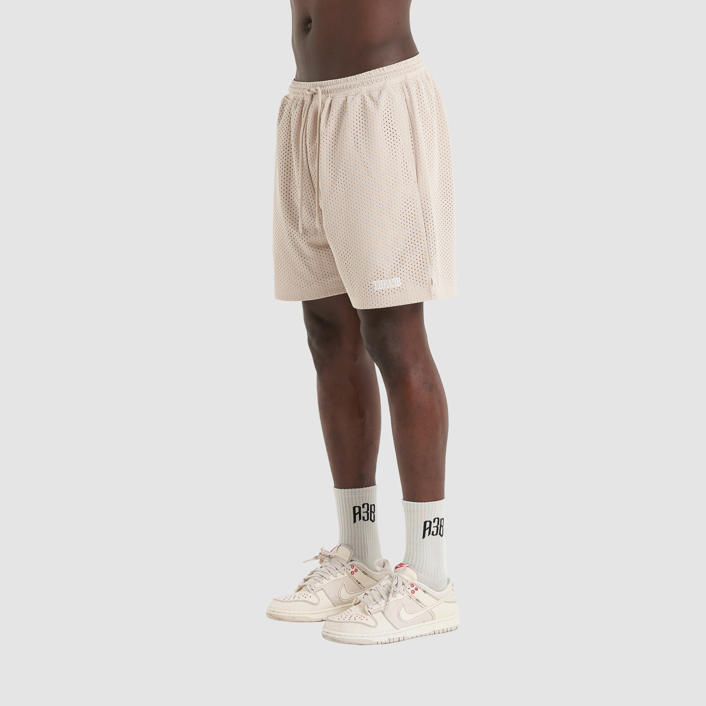 BEWEGINGSKORT BEIGE