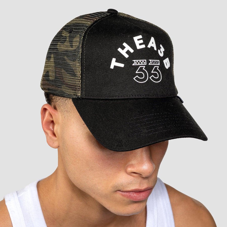 PLAYER 33 TRUCKERCAP - ZWART/CAMOUFLAGE